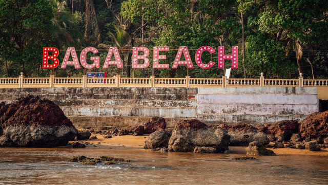 Crowded beach with lights and music showcasing Baga Beach nightlife